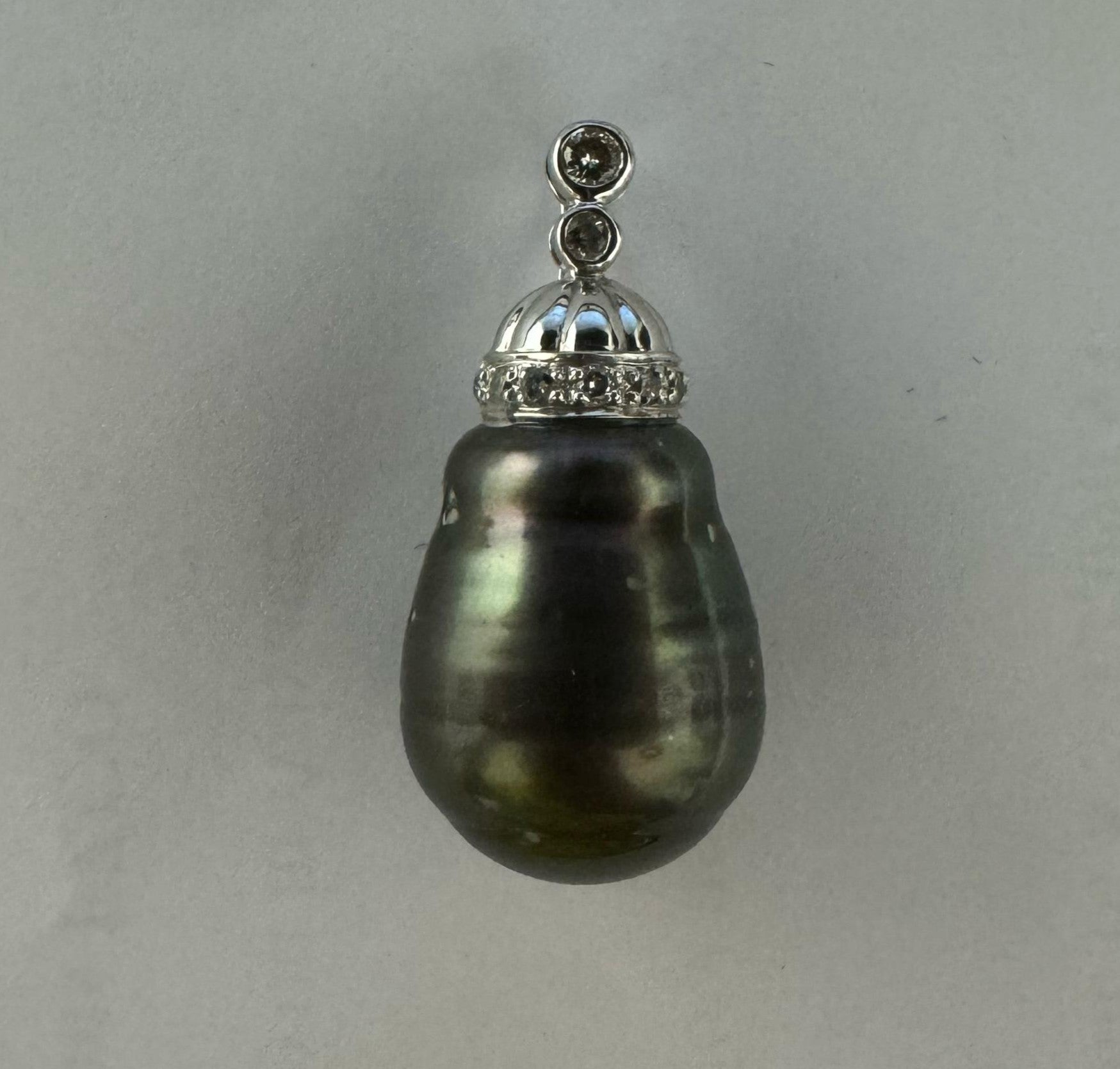 0.29 ct pear cut pearl and diamond pendant