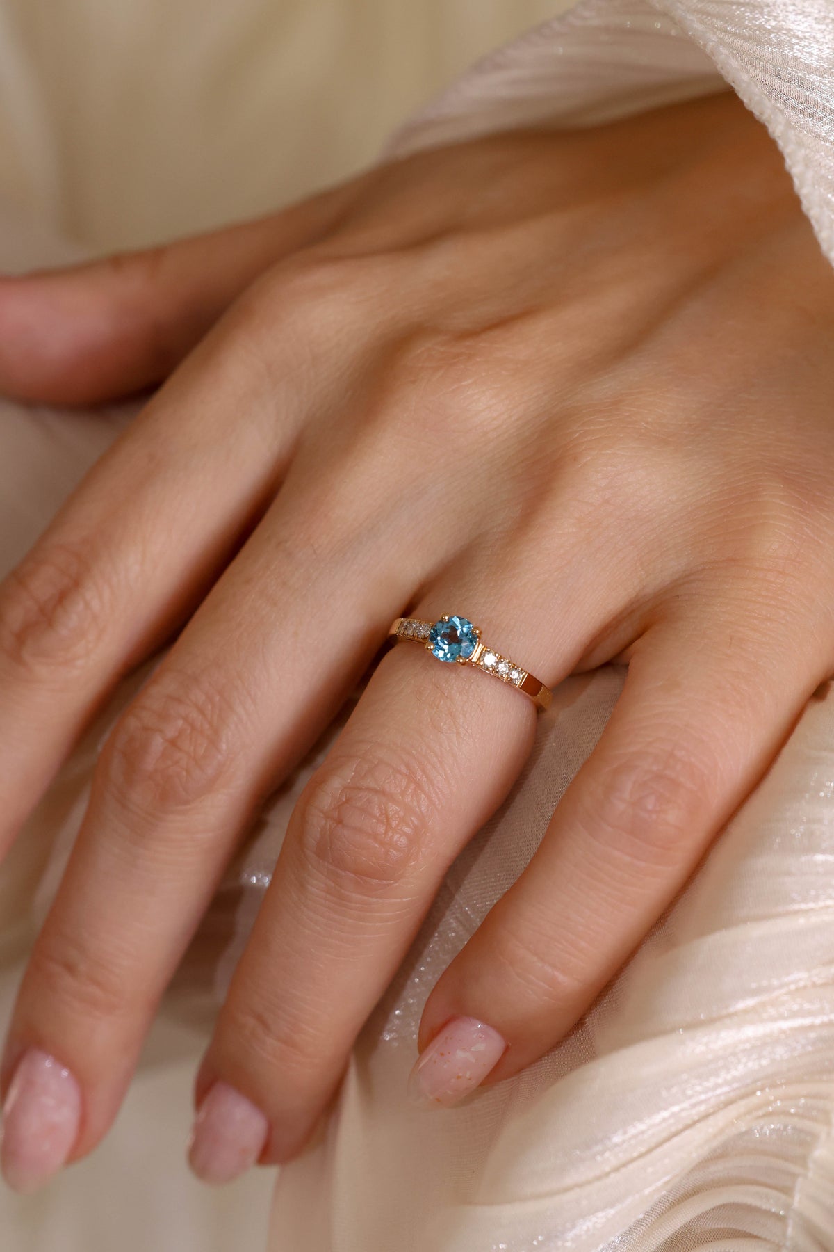 Blue Topaz and Diamond Ring