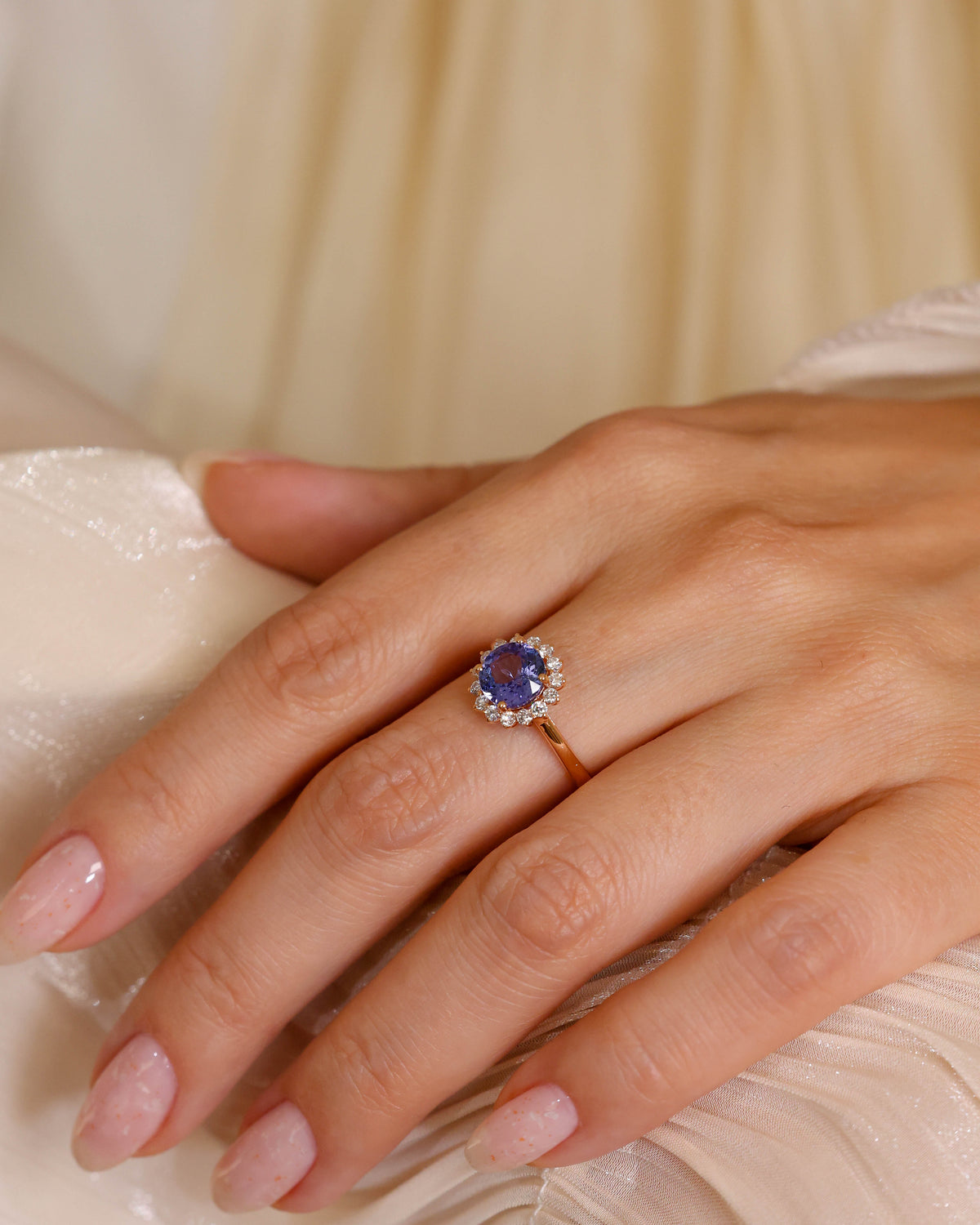Oval Tanzanite and Diamond Halo Ring in 18K Rose Gold, 1.60 ct