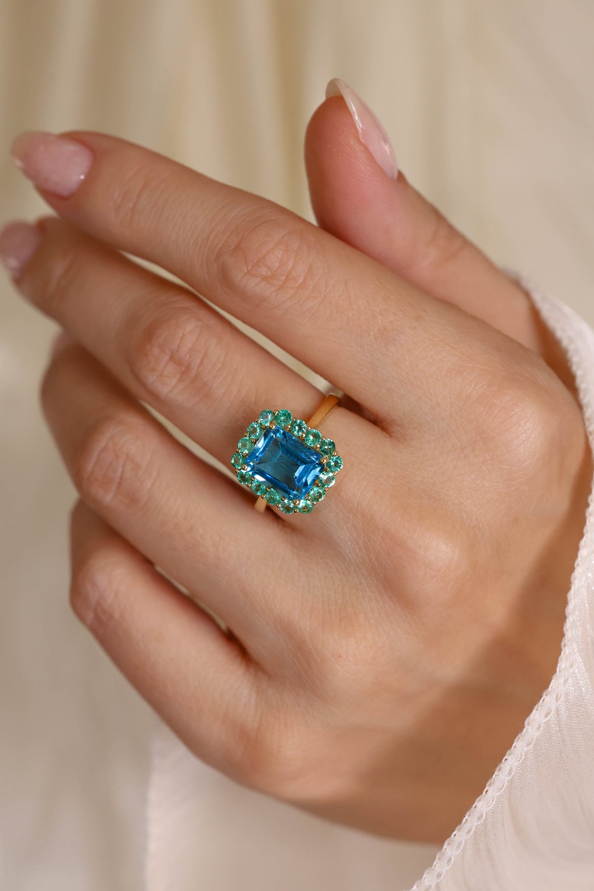 Blue Topaz and Emerald Halo Cocktail Ring – view 2