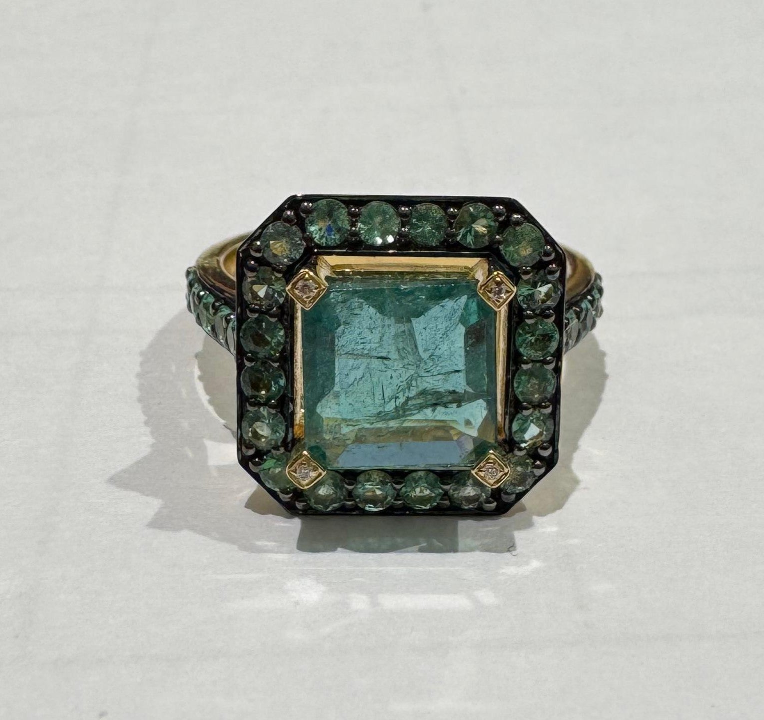 0.02 ct emerald cut color stone and diamond 18k yellow gold ring