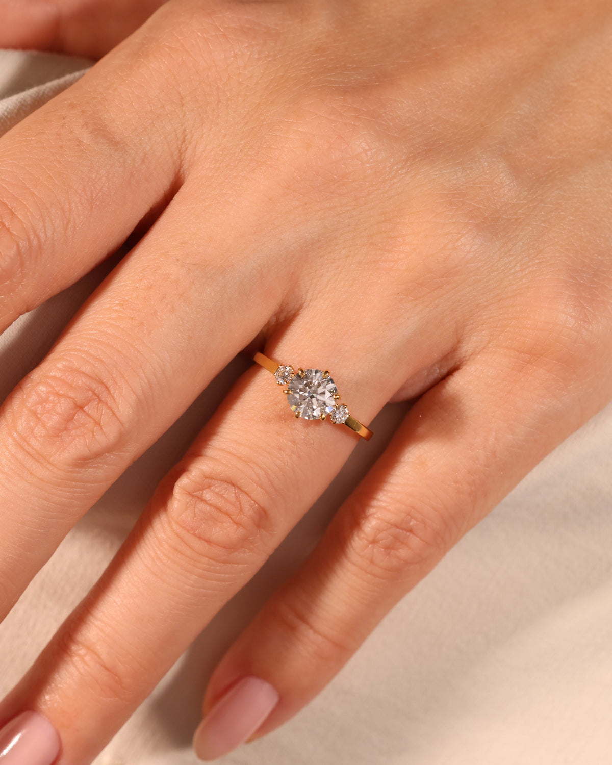 ROUND LAB DIAMOND THREE-STONE RING