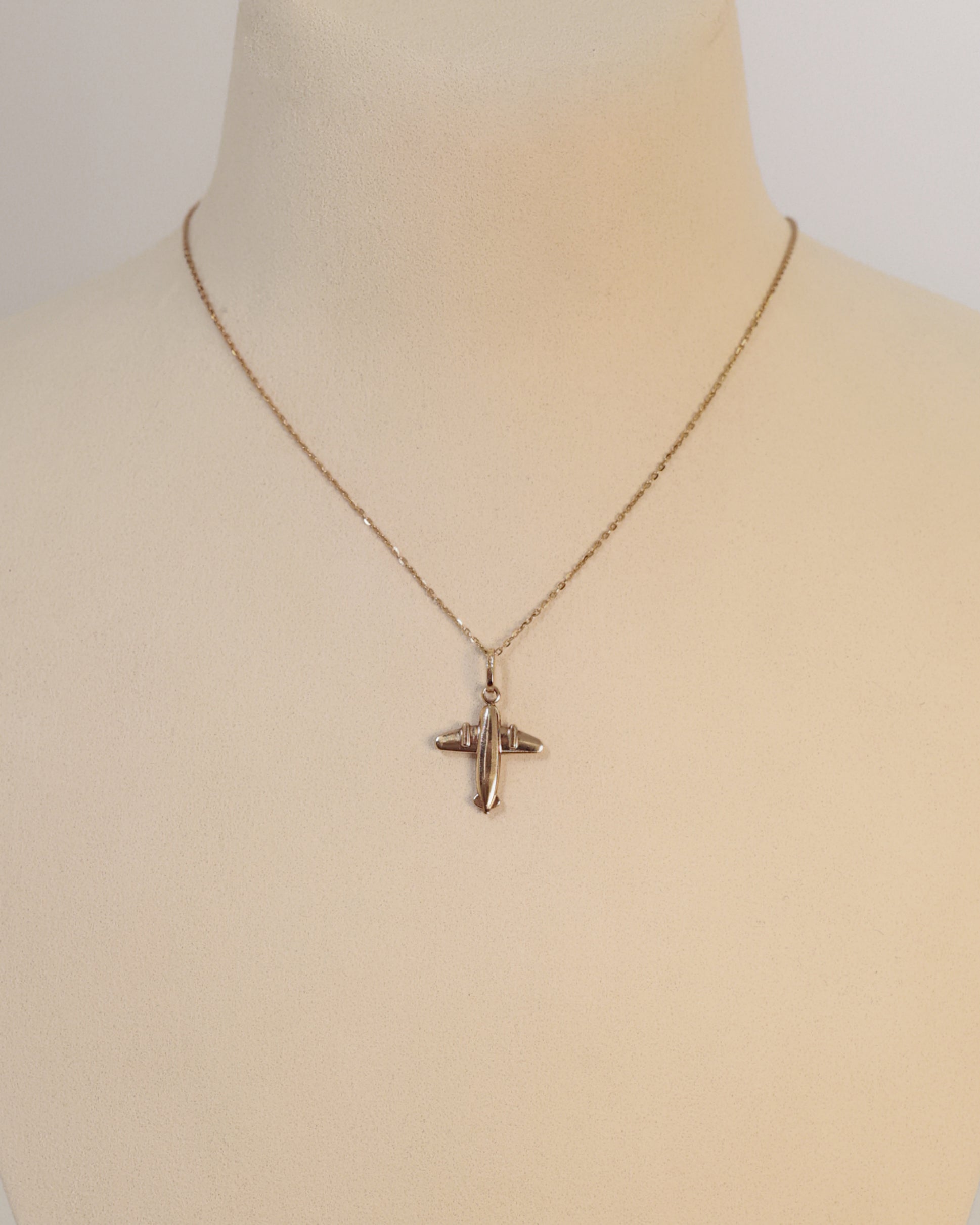 GOLD AIRPLANE PENDANT