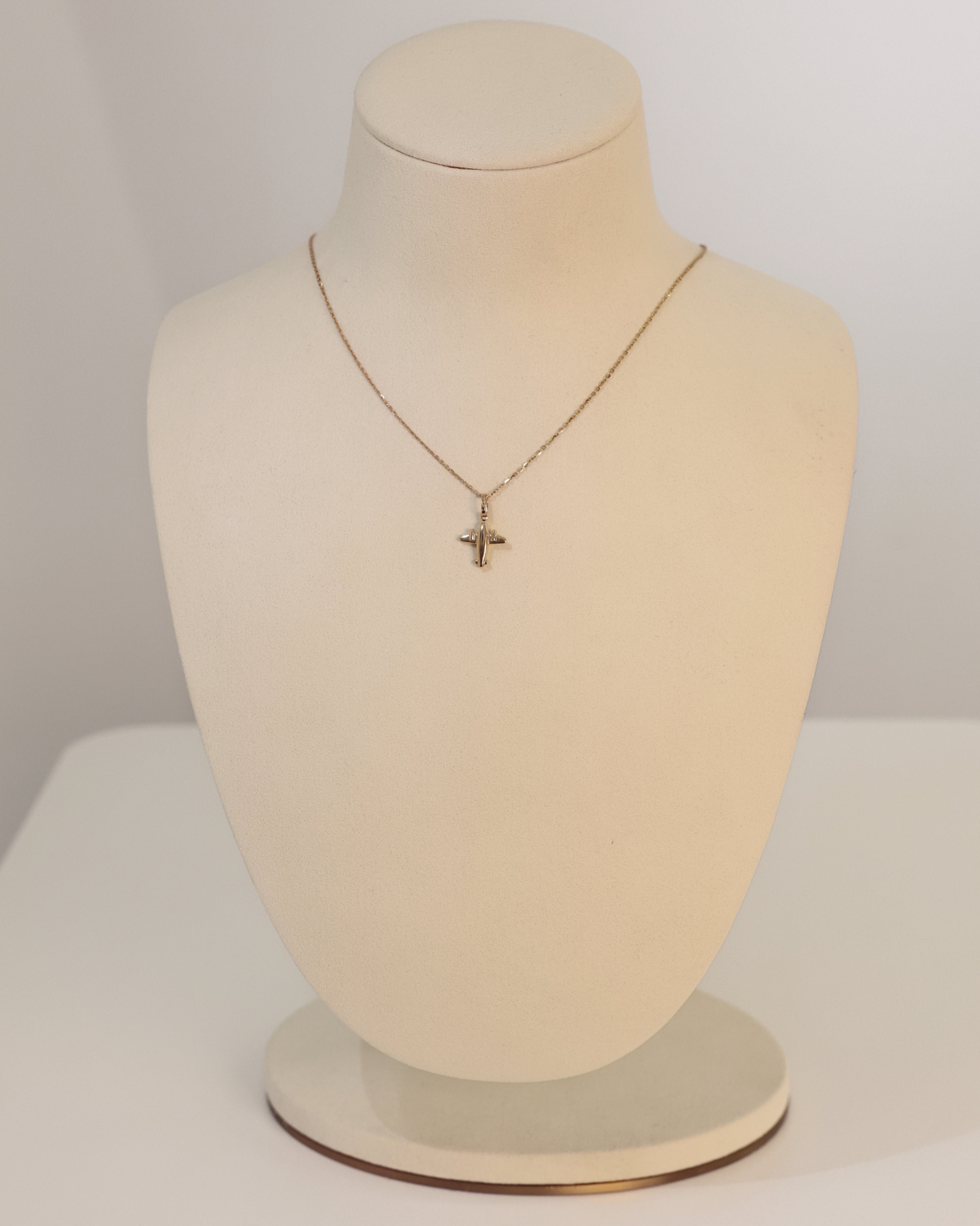 GOLD AIRPLANE PENDANT