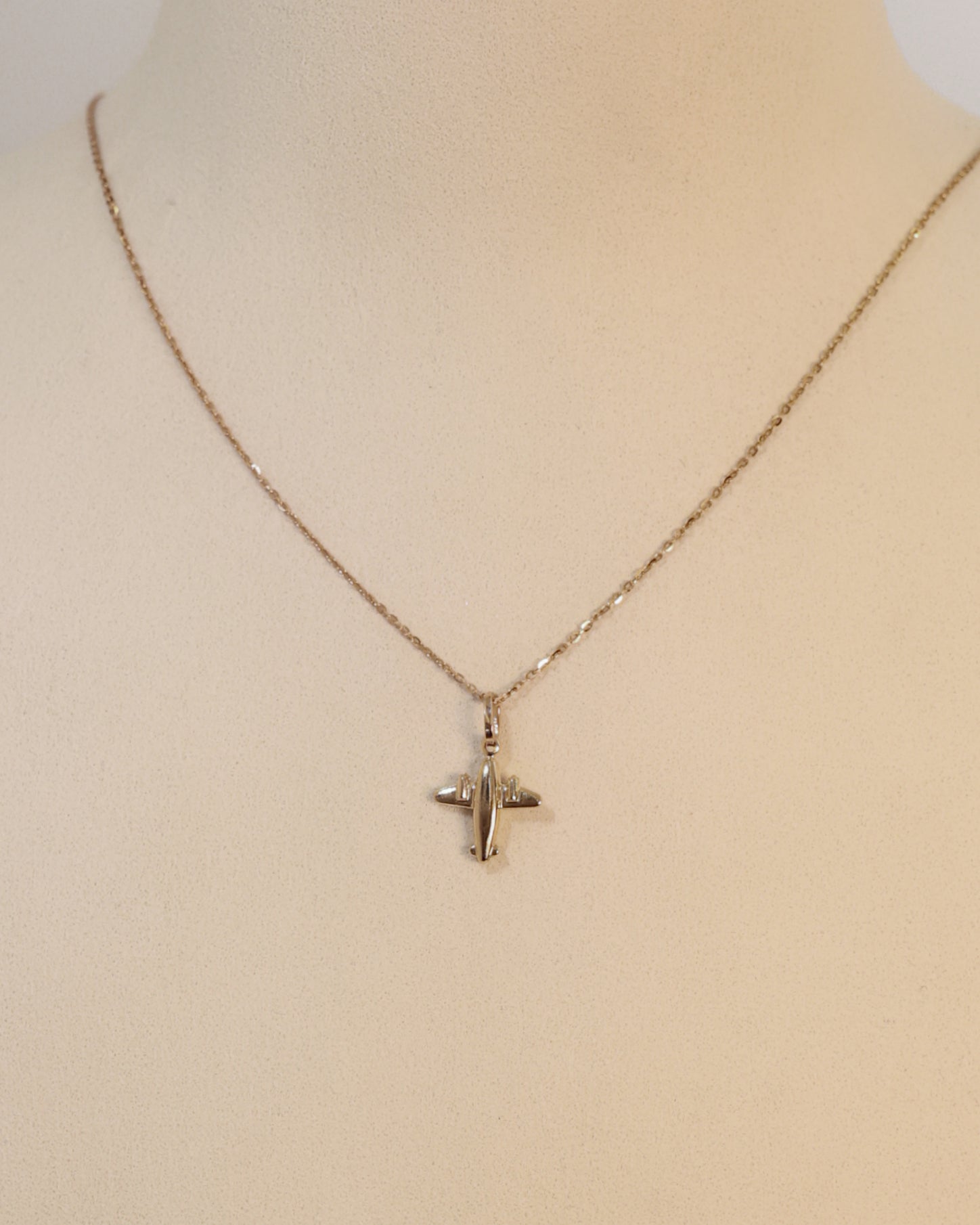 GOLD AIRPLANE PENDANT