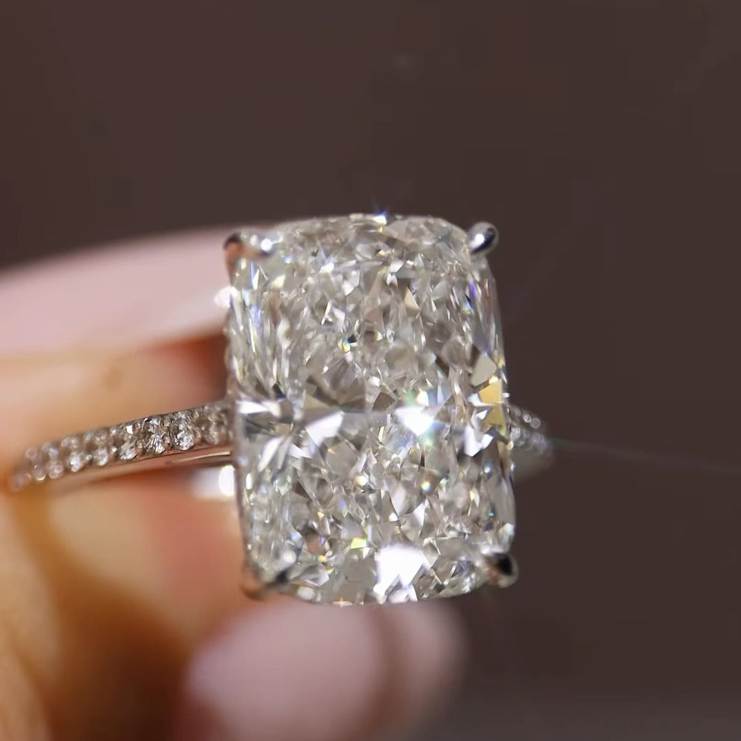 Custom elongated cushion diamond engagement ring, 6.93 ct, with hidden halo and eternity band by BYORO Dubai