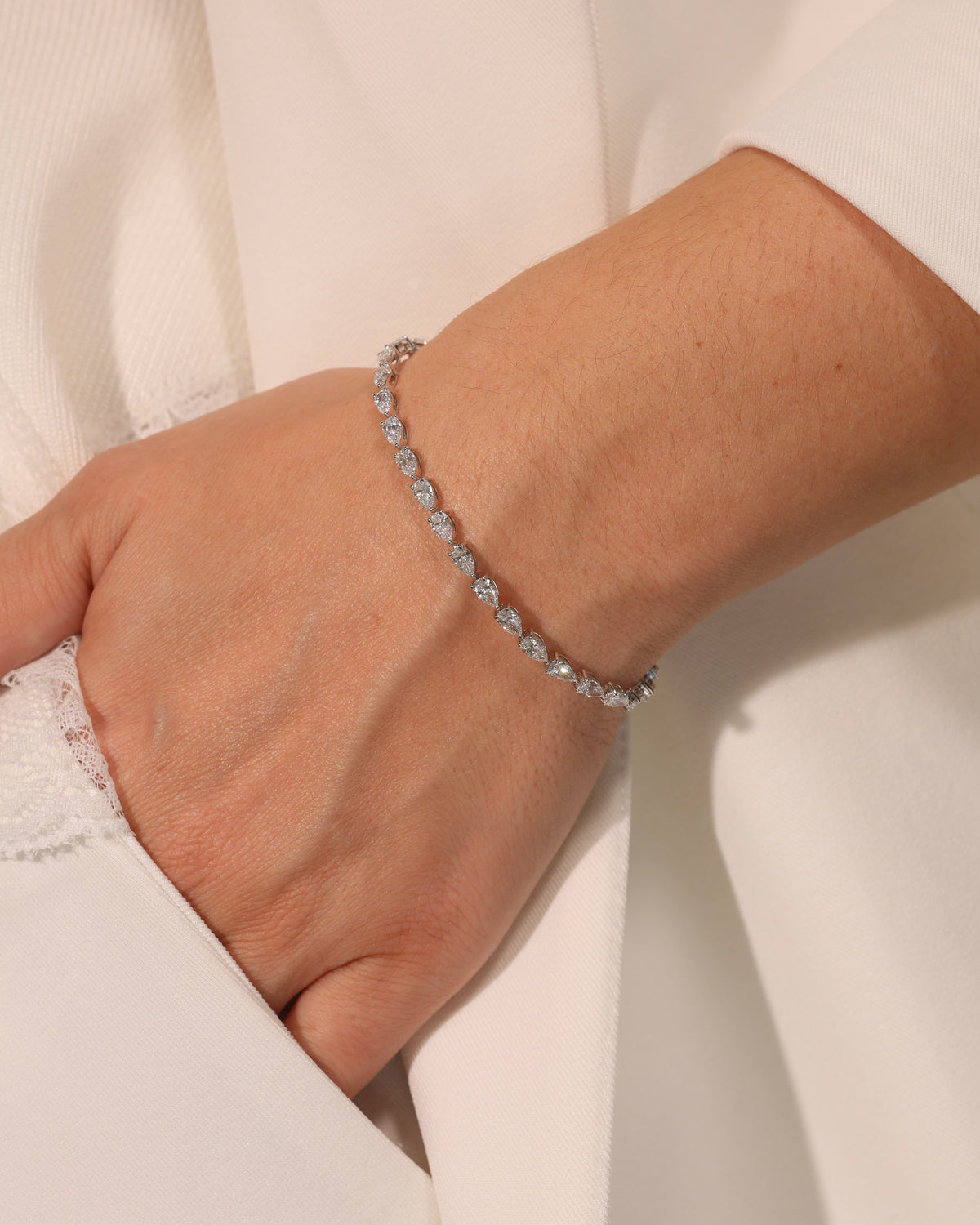 5.22 ct Pear Lab Diamond Tennis Bracelet, worn on wrist – DBR00091