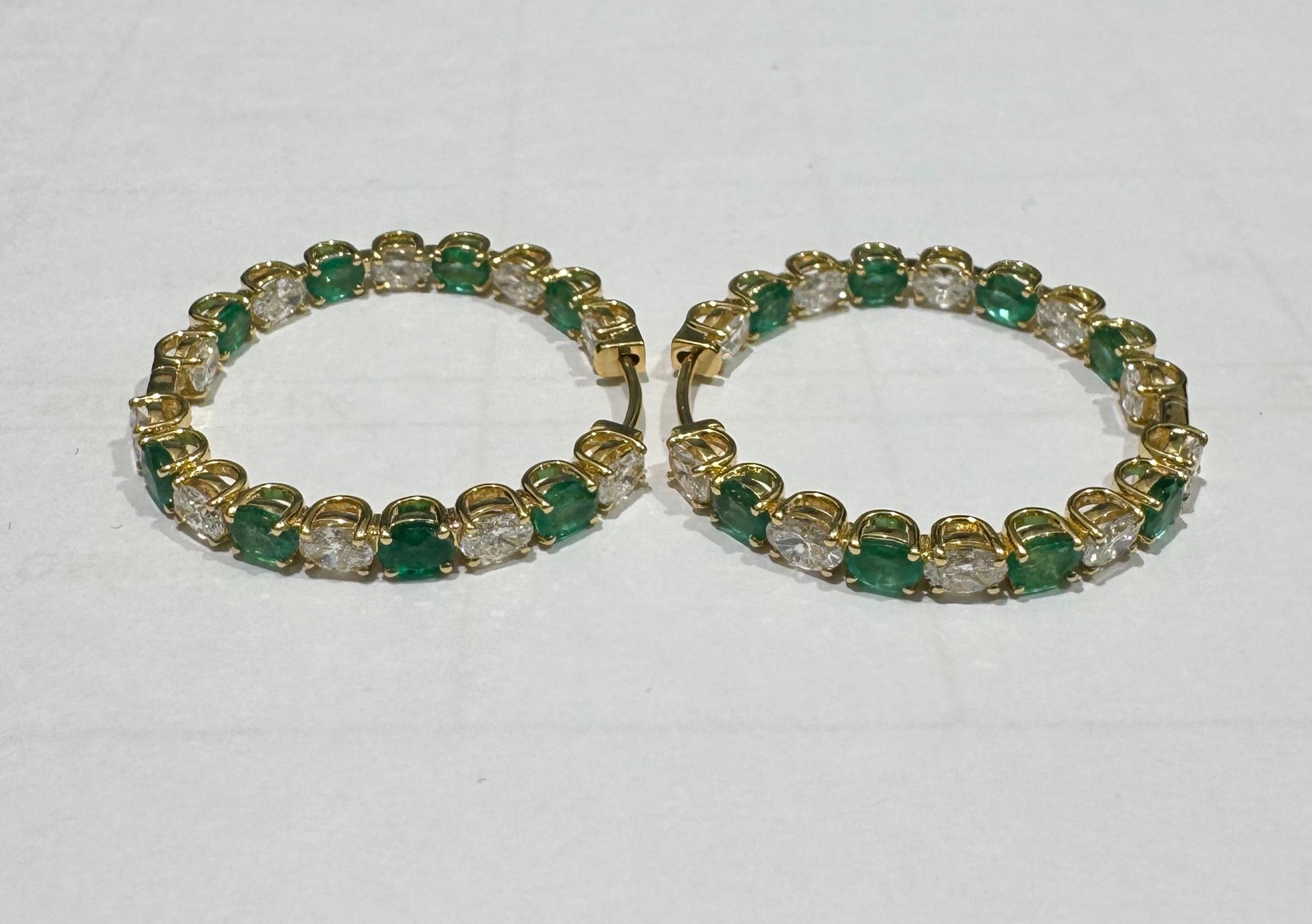 2.60 ct oval cut emerald and lab grown diamond 18k yellow gold earring