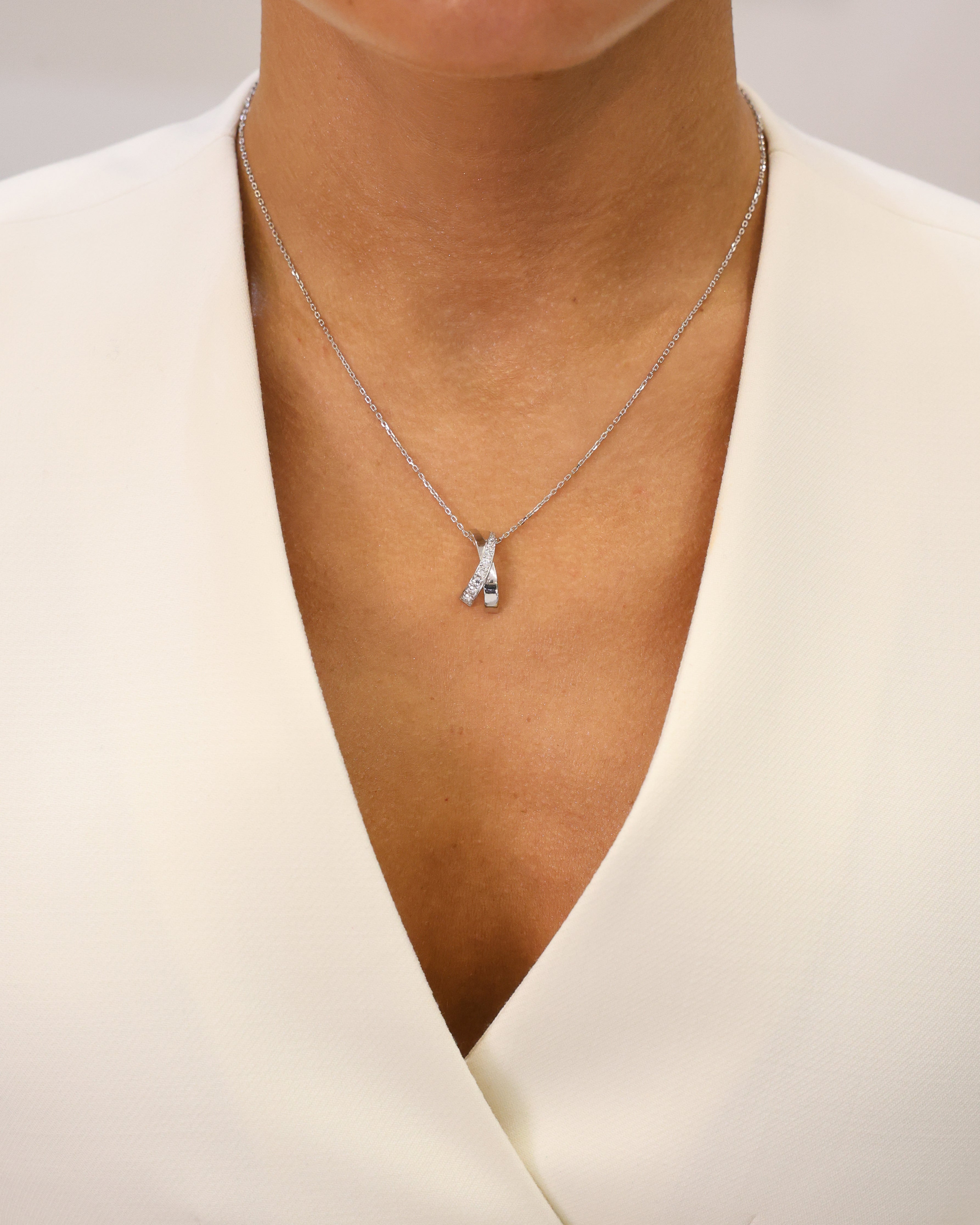 NATURAL DIAMOND CROSSOVER NECKLACE