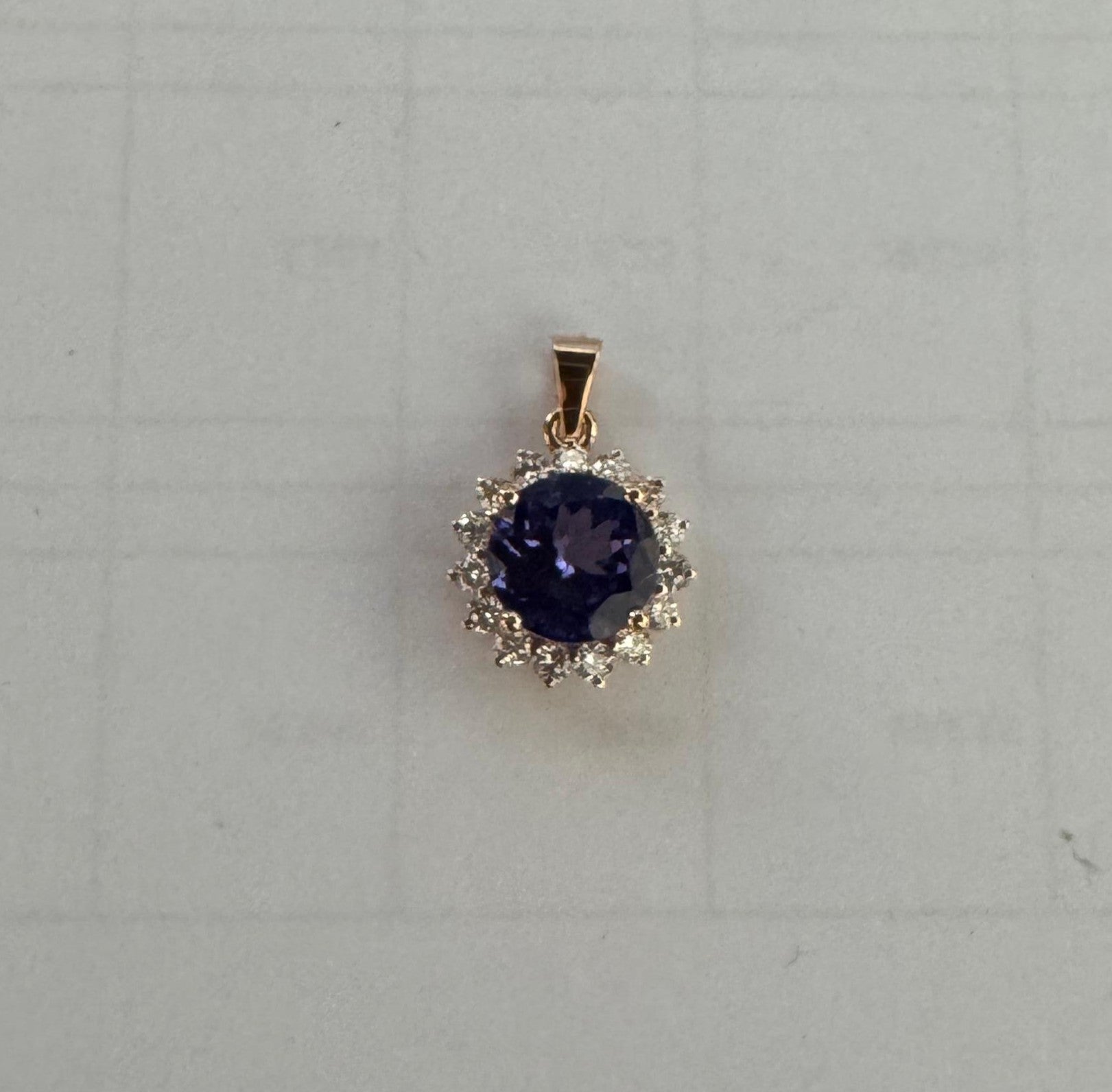 0.36 ct round cut tanzanite and diamond 18k rose gold pendant
