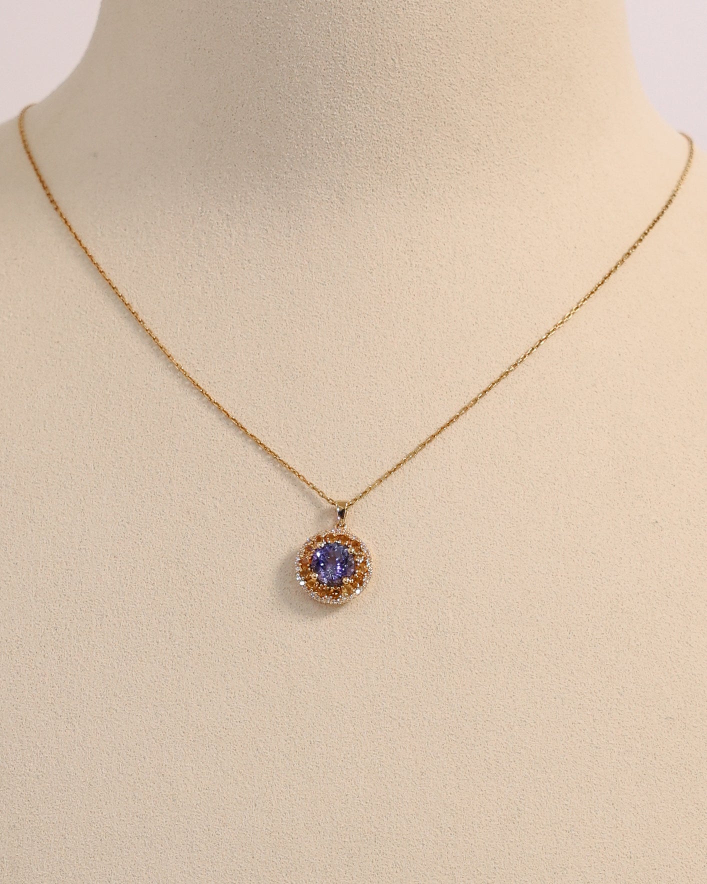 NATURAL TANZANITE & YELLOW DIAMOND HALO PENDANT