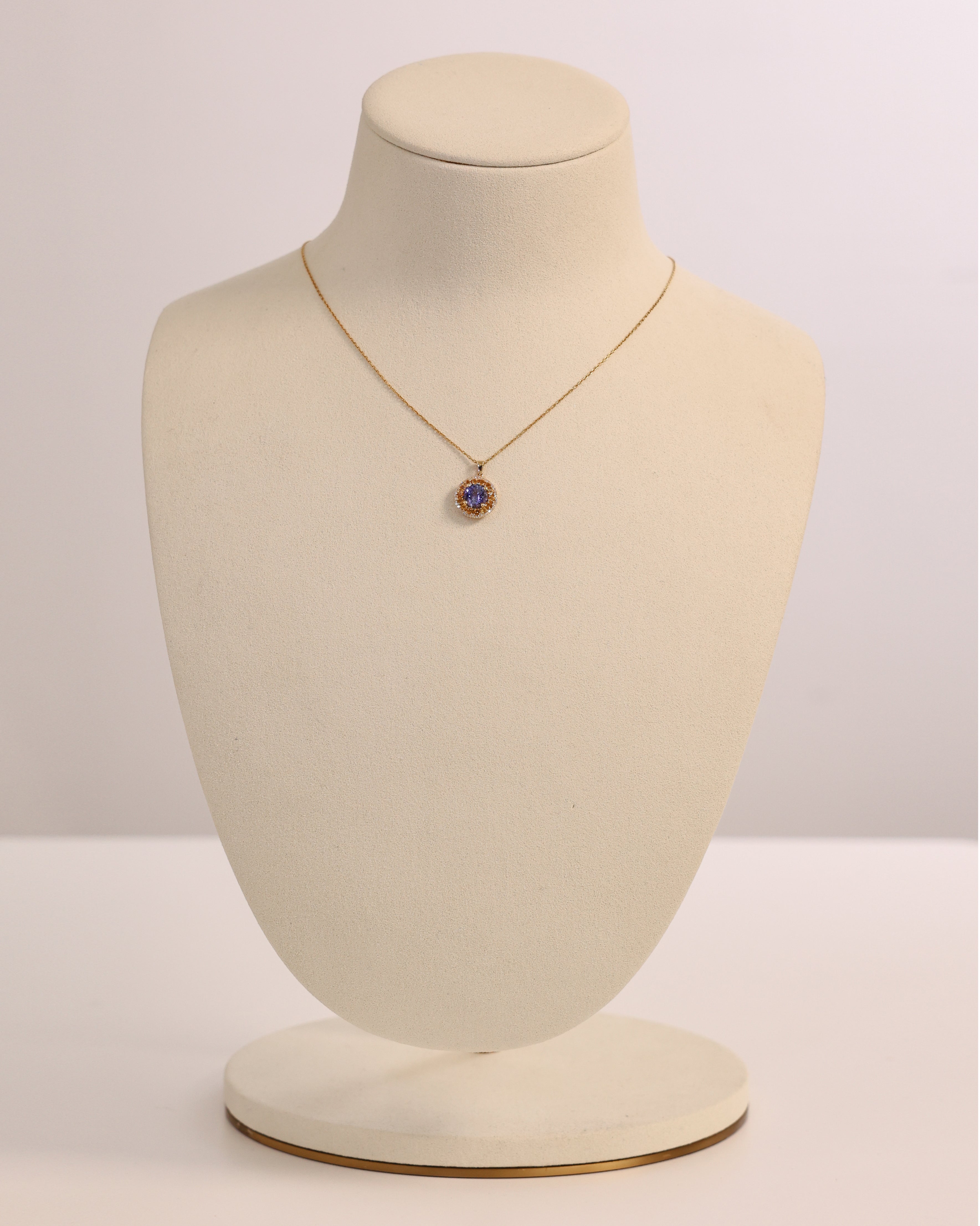 NATURAL TANZANITE & YELLOW DIAMOND HALO PENDANT