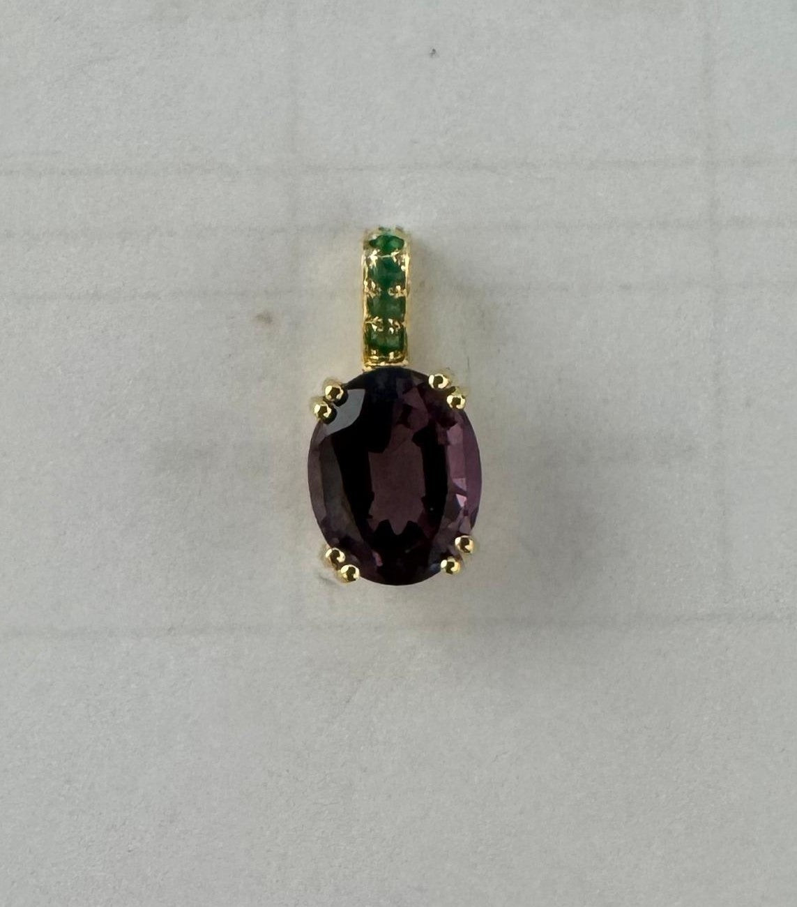 2.73 ct round cut emerald pendant