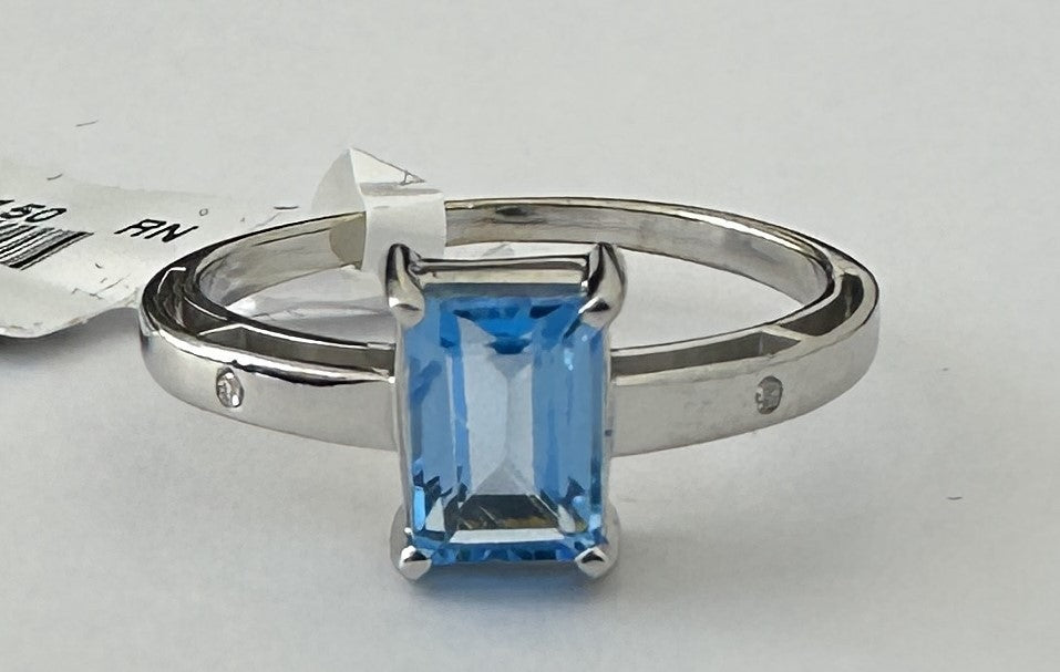 0.02 ct Diamond and 1.50 ct Blue Topaz Ring in 18K White Gold