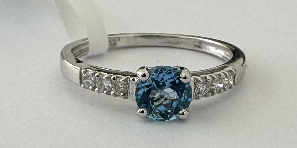 0.13 ct Diamond and 0.61 ct Topaz Ring in 18K White Gold