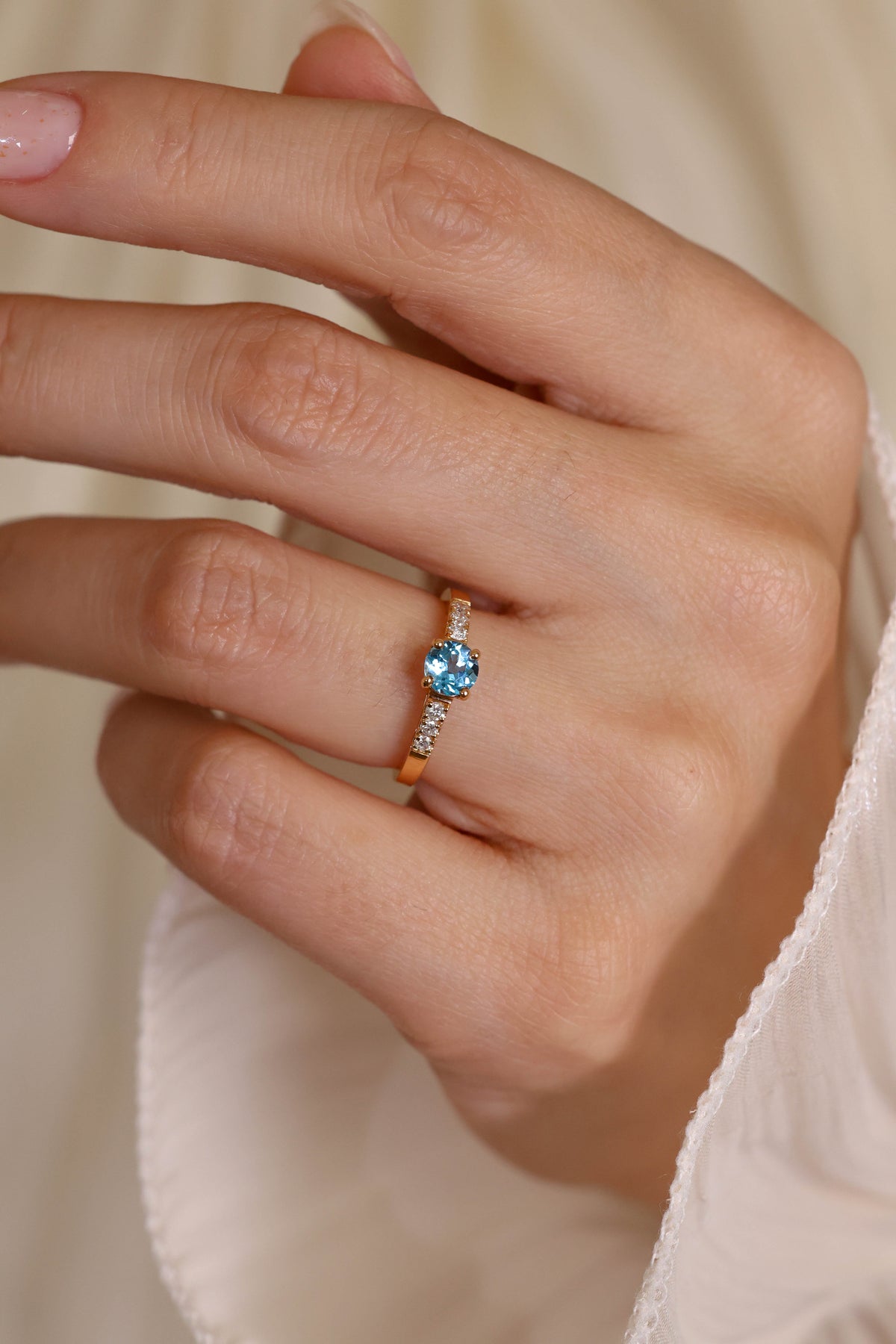 Blue Topaz and Diamond Ring