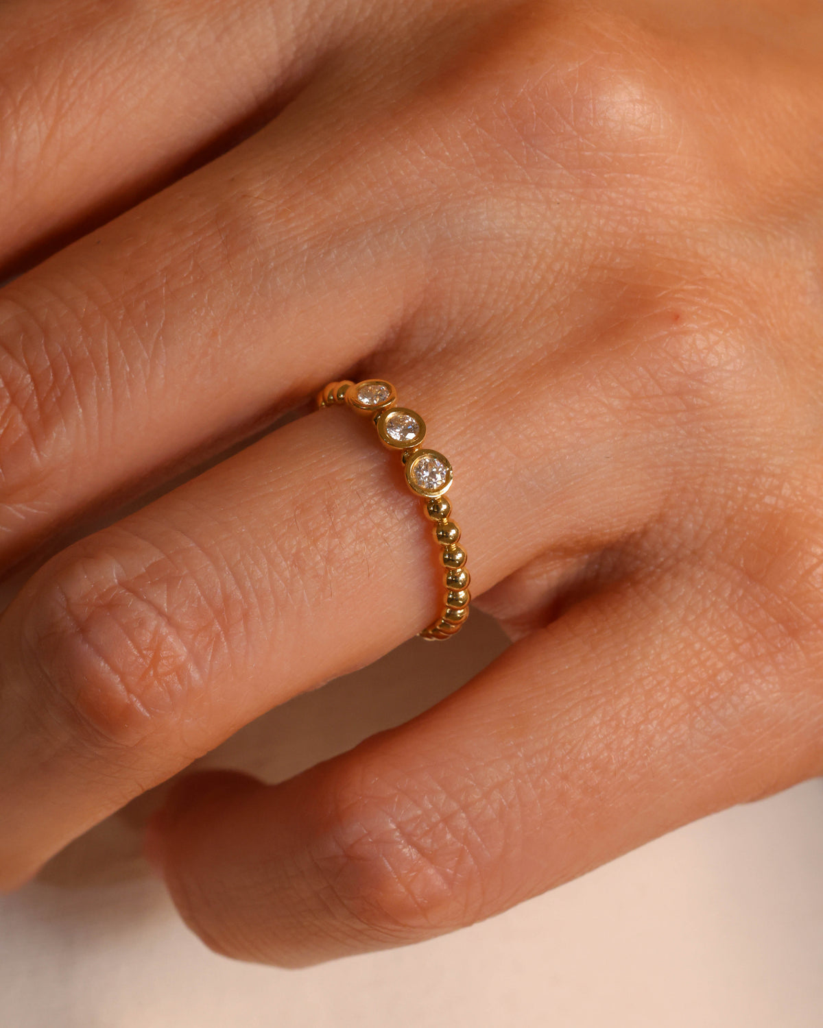 Three-Stone Bezel Diamond Ring in 18K Yellow Gold – view 2