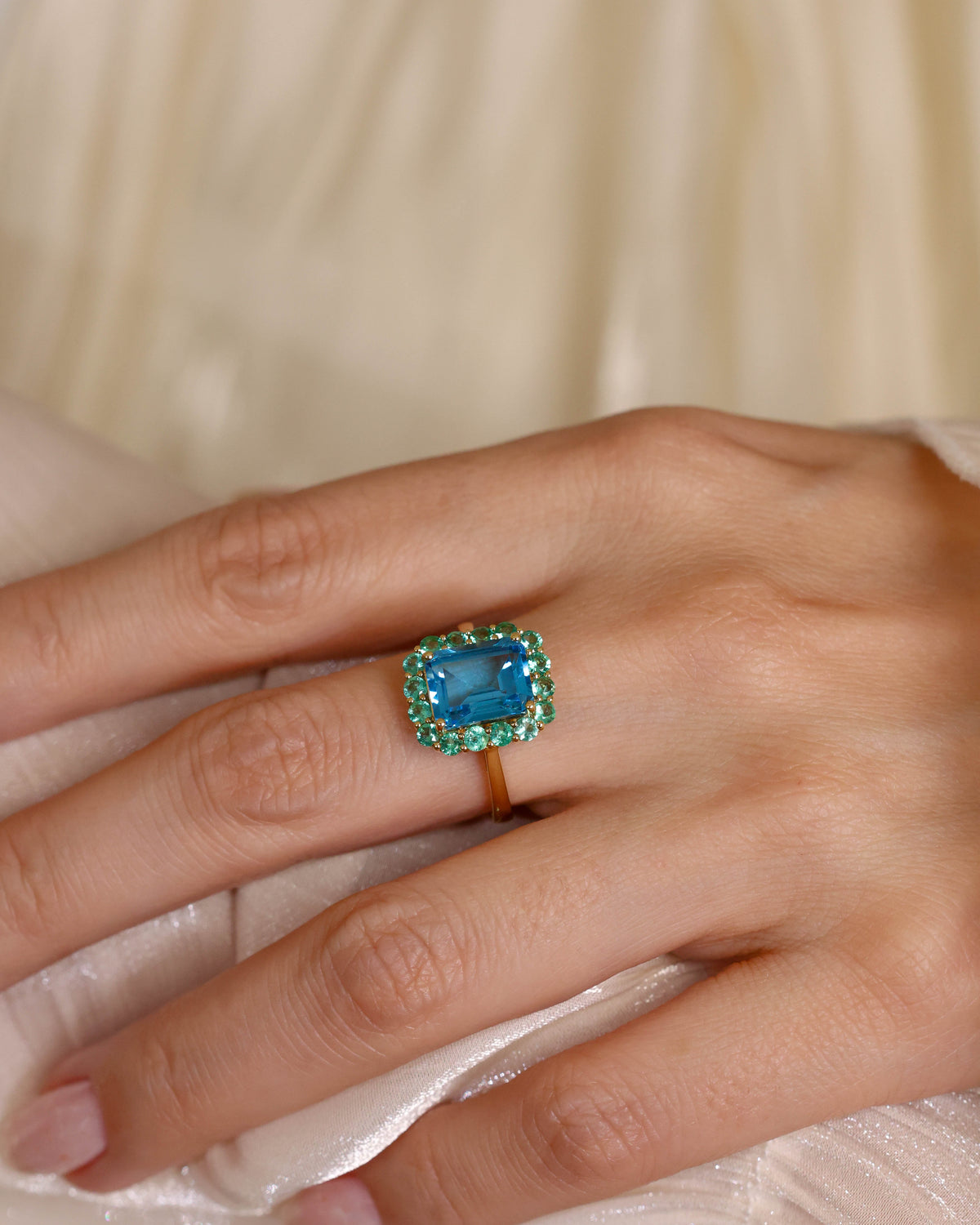 Blue Topaz and Emerald Halo Cocktail Ring, 4.37 ct