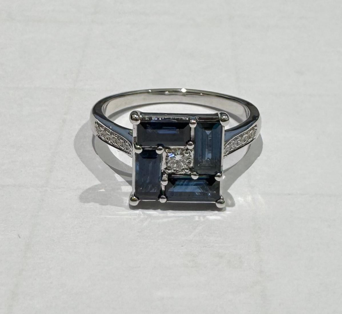 0.20 ct baguette cut sapphire and diamond 18k white gold ring