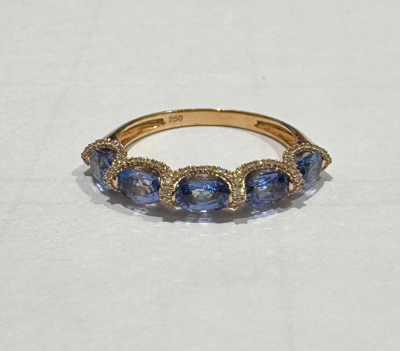 0.30 ct oval cut tanzanite and diamond 18k rose gold ring