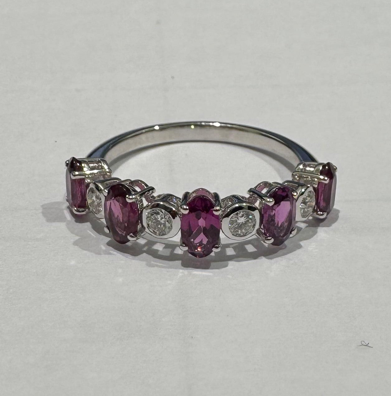 0.20 ct oval cut amethyst and diamond 18k white gold ring