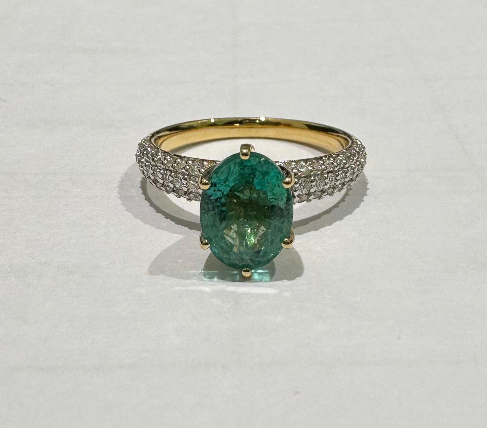 0.43 ct oval cut emerald and diamond 18k yellow gold ring