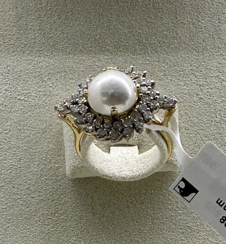 0.66 ct pear cut pearl and diamond 18k yellow gold ring