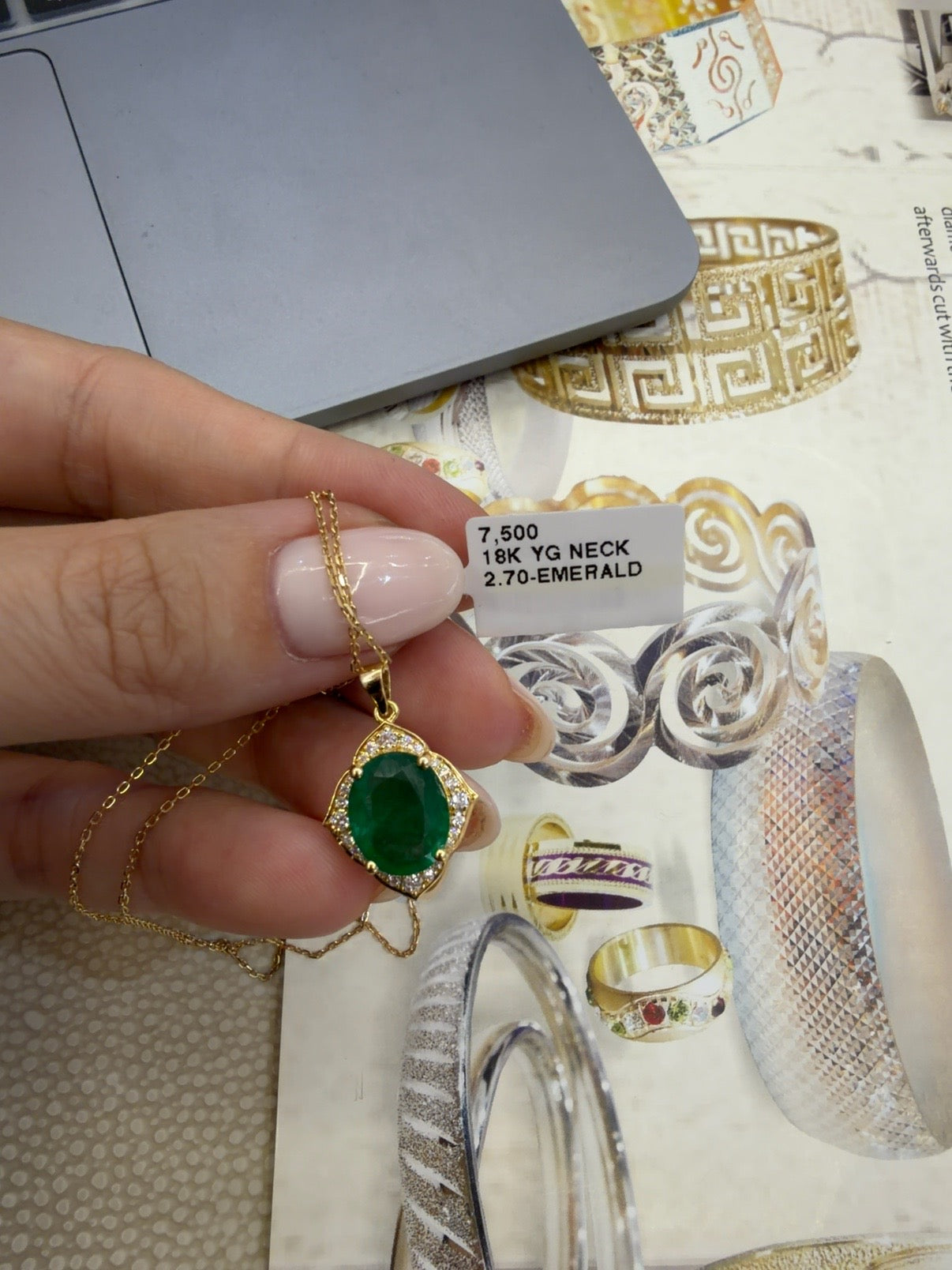 NATURAL OVAL EMERALD & DIAMOND HALO NECKLACE