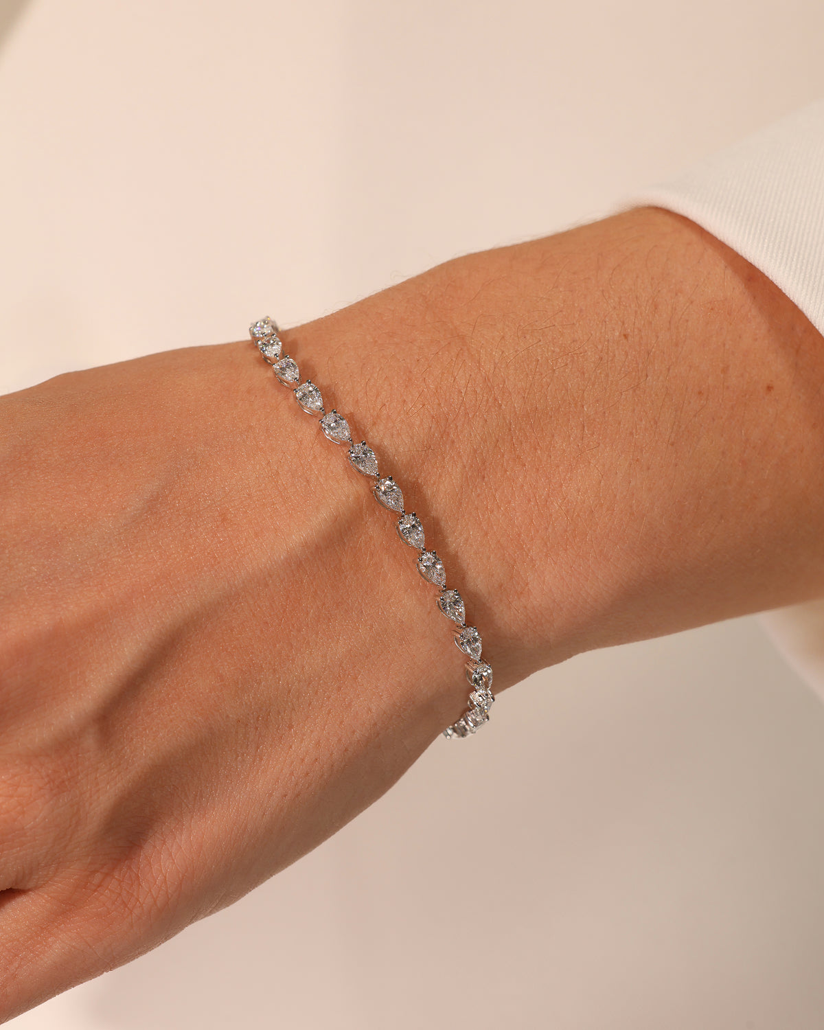5.22 ct Pear Lab Diamond Tennis Bracelet, worn on wrist – DBR00091