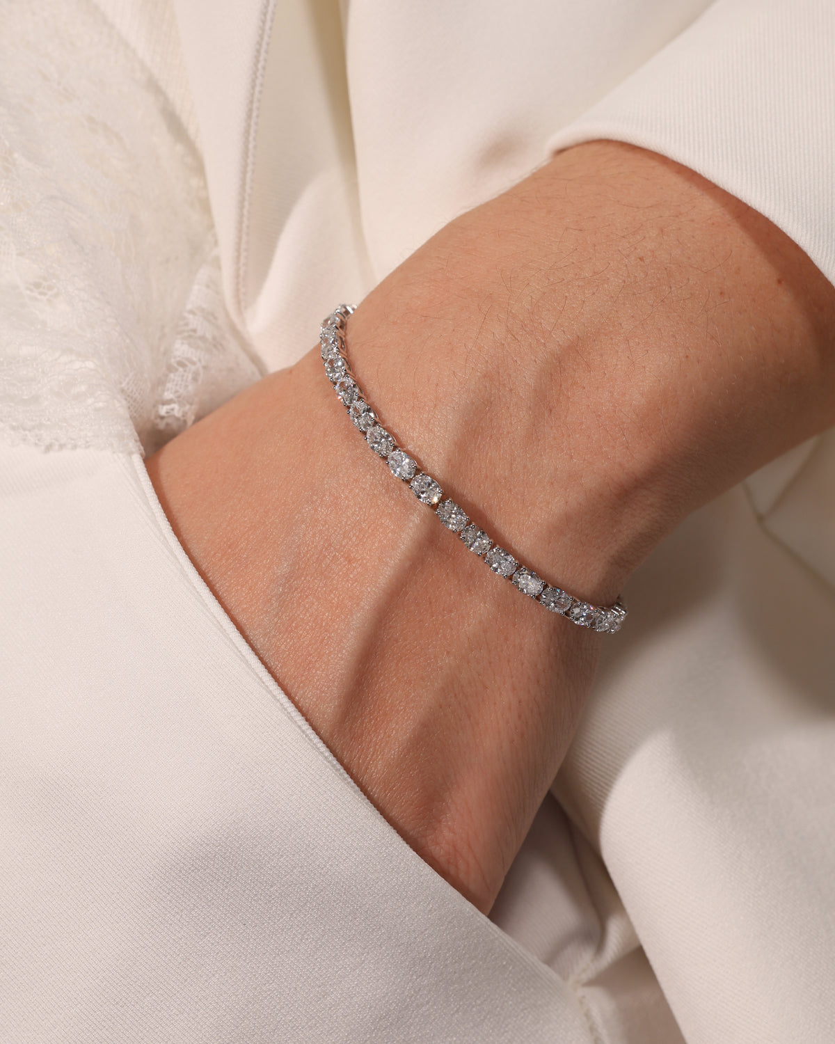 8.22 ct Oval Lab Diamond Tennis Bracelet, worn on wrist – DBR00092